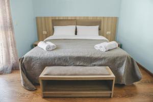 Letto o letti in una camera di Hotel panorama svaneti