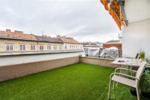 Balkón alebo terasa v ubytovaní BpR Garay Suite with rooftop terrace & A/C