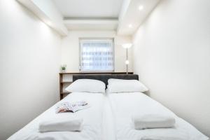 Posteľ alebo postele v izbe v ubytovaní BpR Garay Suite with rooftop terrace & A/C