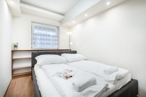 Posteľ alebo postele v izbe v ubytovaní BpR Garay Suite with rooftop terrace & A/C