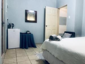 Un ou plusieurs lits dans un hébergement de l'établissement Ankuweni Guest house