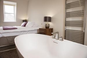 A bathroom at The Birchtree Hotel 