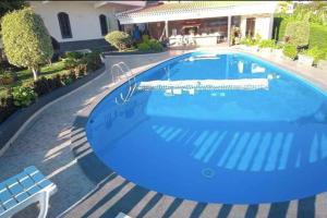 Bassein majutusasutuses Arcos Grand Suites with pool või selle lähedal