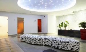 Postel nebo postele na pokoji v ubytování Renaissance Hanioti Resort + 20 fotografií