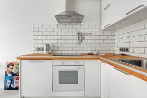 Kuchyňa alebo kuchynka v ubytovaní GRANO FLATS Gdańsk - Aura I