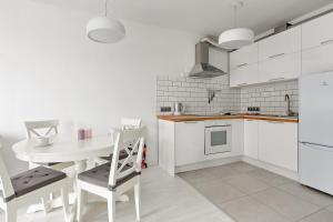 Kuchyňa alebo kuchynka v ubytovaní GRANO FLATS Gdańsk - Aura I