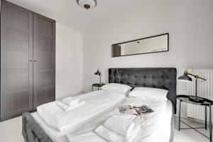 Posteľ alebo postele v izbe v ubytovaní GRANO FLATS Gdańsk - Aura I