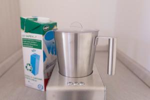 a blender sitting on a counter next to a box at B&B NONNO PEPPE in Perano