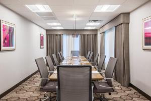 a long conference room with a long table and chairs at Crowne Plaza Portland - Lake Oswego, an IHG Hotel in Lake Oswego