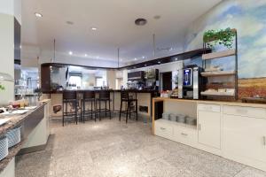 
a kitchen filled with lots of counter space at Hotel San Juan de los Reyes in Toledo
