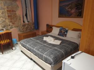 Posteľ alebo postele v izbe v ubytovaní Locanda Dalla Compagnia + 31 fotografií