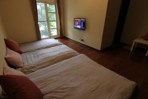 Φωτογραφία από το άλμπουμ του Find Alice Homestays σε Tongxiao
