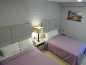 Postel nebo postele na pokoji v ubytování Hotel Boutique Boca - Veracruz