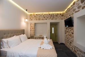 Llit o llits en una habitació de Acrothea Perdika
