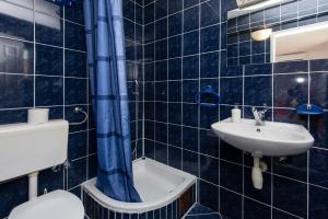 Kúpeľňa v ubytovaní Apartments Jane Perna + 37 fotografií