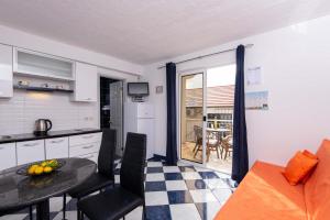 Kuchyňa alebo kuchynka v ubytovaní Apartments Jane Perna