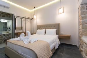 Llit o llits en una habitació de Acrothea Perdika