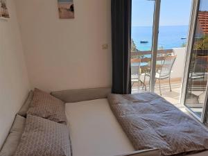 Katil atau katil-katil dalam bilik di Seaside stay Rošić