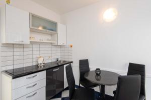 Kuchyňa alebo kuchynka v ubytovaní Apartments Jane Perna