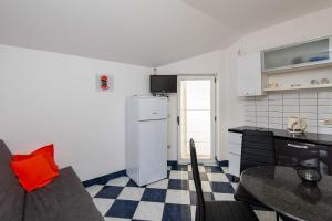 Kuchyňa alebo kuchynka v ubytovaní Apartments Jane Perna