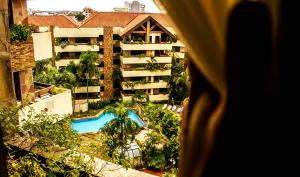 Vue sur la piscine de l'établissement Apart Hotel TOBOROCHI ou sur une piscine à proximité