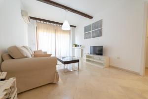 Μια τηλεόραση ή/και κέντρο ψυχαγωγίας στο Apartamento Almunia
