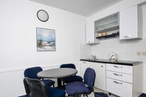 Kuchyňa alebo kuchynka v ubytovaní Apartments Jane Perna