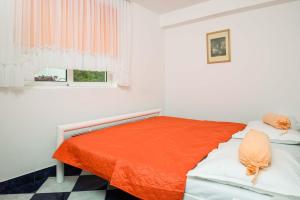 Posteľ alebo postele v izbe v ubytovaní Apartments Jane Perna