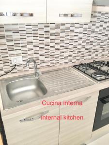 Cucina o angolo cottura di L'attico di Greta,Etna house