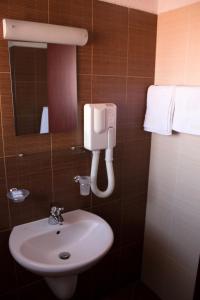 Kupatilo u objektu Bizev Hotel +64 fotografije