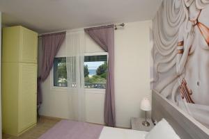 Posteľ alebo postele v izbe v ubytovaní Divine Villa