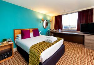 Postel nebo postele na pokoji v ubytování Copthorne Tara Hotel London Kensington + 37 fotografií