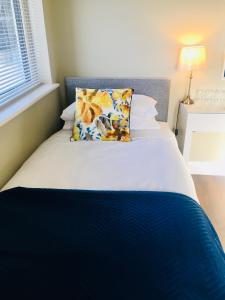 Voodi või voodid majutusasutuse Doolin Village Accomodation toas