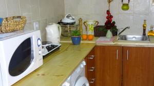 A kitchen or kitchenette at Apartment Alexander