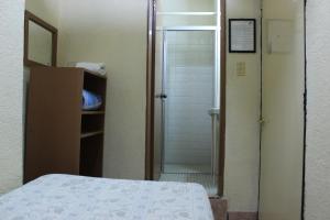 Postel nebo postele na pokoji v ubytování Hotel Plaza Aleman