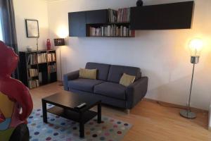 Posezení v ubytování Appartement proche de Paris comme à la maison