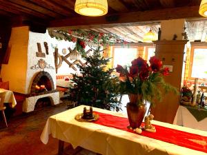 Restauracja lub miejsce do jedzenia w obiekcie Pension Nina & Gasthof Alpenrose