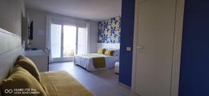 Posteľ alebo postele v izbe v ubytovaní Stile libero b&b