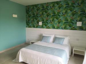 Posteľ alebo postele v izbe v ubytovaní Stile libero b&b