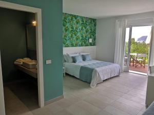 Posteľ alebo postele v izbe v ubytovaní Stile libero b&b