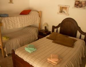 Двухъярусная кровать или двухъярусные кровати в номере Kau Chaink casa de campo