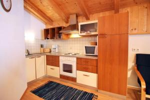 Kuchyň nebo kuchyňský kout v ubytování Haus Salchner