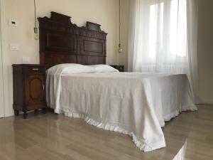 Posteľ alebo postele v izbe v ubytovaní Corte Viviani
