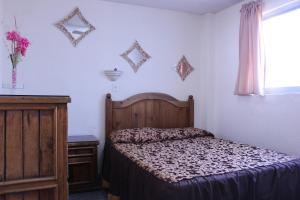 Postel nebo postele na pokoji v ubytování Hotel Plaza Aleman + 29 fotografií