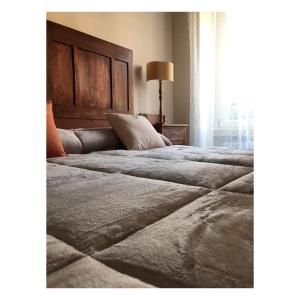 Кровать или кровати в номере Corte Viviani