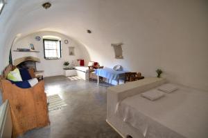 a living room with a couch and a table at Axion Studios in Aroniadika