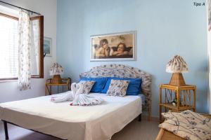 A bed or beds in a room at Casa Vacanze Villa Francy
