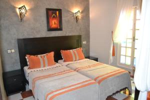 Voodi või voodid majutusasutuse Hotel Cap Sim toas