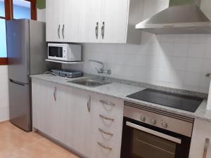 Η κουζίνα ή μικρή κουζίνα στο Sant Miquel +11 φωτογραφίες