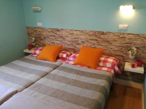 Posteľ alebo postele v izbe v ubytovaní Apartamento Talako